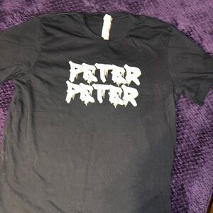 Black t-shirt. Peter Peter Pumpkin eater